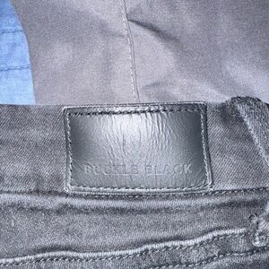 Women’s skinny buckle black jean